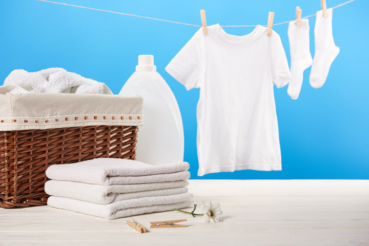 Fresh white laundry hanging on a washing line